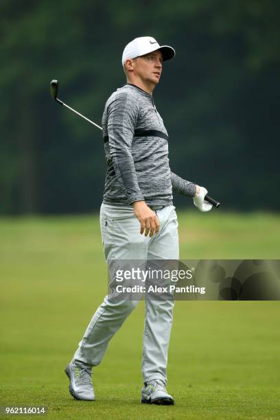 Alex Noren of Sweden reacts to a shot during day one of the 2018 BMW PGA Championship at Wentworth on May 24, 2018 in Virginia Water, England.