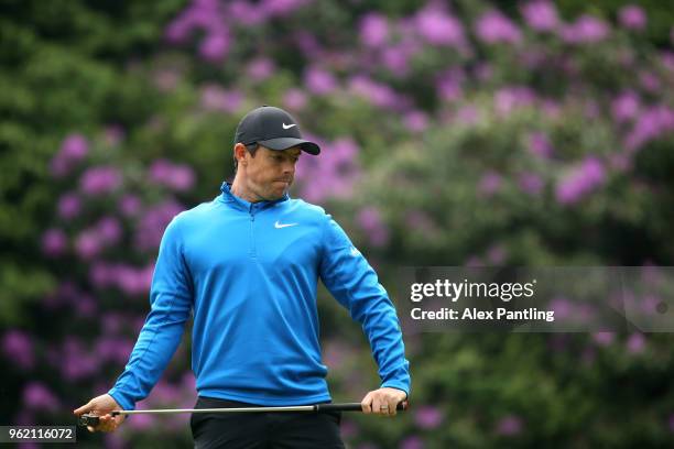 Rory McIlroy of Northern Ireland reacts on the 17th green during day one of the 2018 BMW PGA Championship at Wentworth on May 24, 2018 in Virginia...