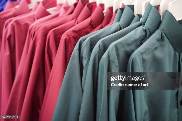colourful baju melayu for hari raya on sale - baju melayu stock pictures, royalty-free photos & images