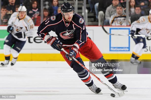 Forward Rick Nash of the Columbus Blue Jackets skates with the puck against the Nashville Predators on January 26, 2010 at Nationwide Arena in...