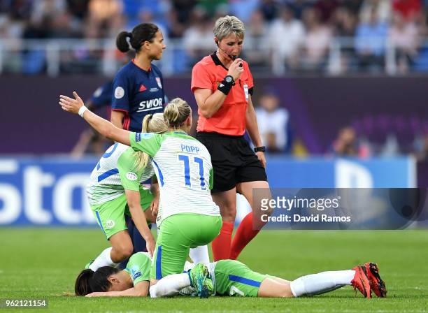 Sara Björk Gunnarsdottir of Vfl Wolfsburg lays on the pitch after injuring herself during the UEFA Womens Champions League Final between VfL...