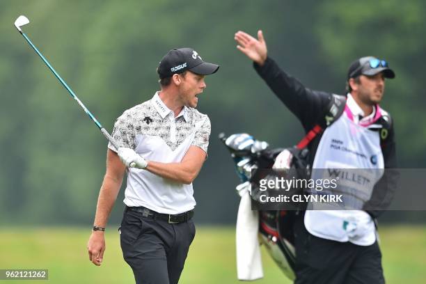 England's Danny Willett reacts after playing a wayward shot on the 17th fairway during his first round 75 on the first day of the PGA Championship at...