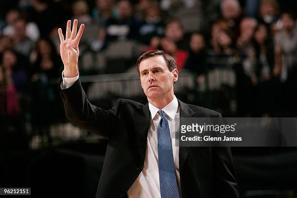 Head coach Rick Carlisle of the Dallas Mavericks signals from the sideline during the game against the Utah Jazz at the American Airlines Center on...