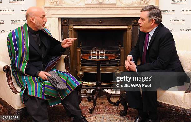 Prime Minister Gordon Brown hosts Afghan President Hamid Karzai at 10 Downing Street on January 27, 2010 in London. The Afghanistan conference begins...