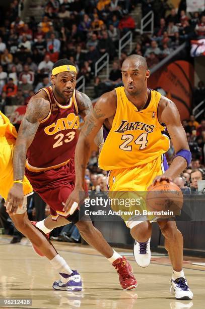 Kobe Bryant of the Los Angeles Lakers drives the ball around LeBron James of the Cleveland Cavaliers during the game on January 21, 2010 at Quicken...