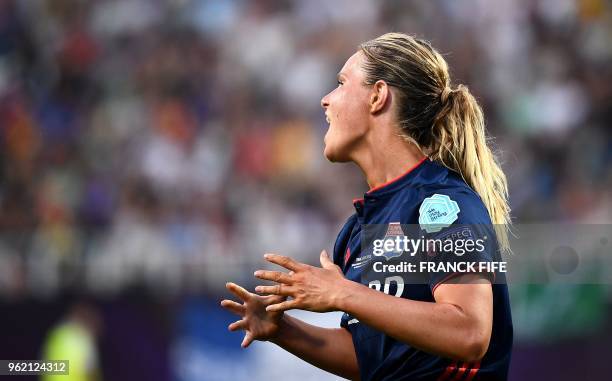 Olympique Lyonnais' French midfielder Amandine Henry reacts after missing a gol opportunity during the UEFA Women's Champions League final football...