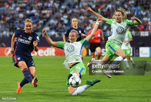 Amandine Henry of Lyon shoots past Alexandra Popp of Vfl Wolfsburg during the UEFA Womens Champions League Final between VfL Wolfsburg and Olympique...