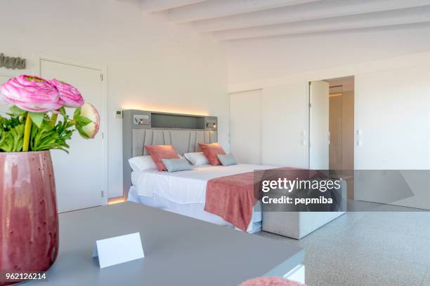 double bed in luxury hotel - pepmiba stock pictures, royalty-free photos & images