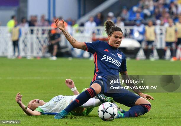 Olympique Lyonnais' German midfielder Dzsenifer Marozsan vies with Wolfsburg's German forward Alexandra Popp during the UEFA Women's Champions League...