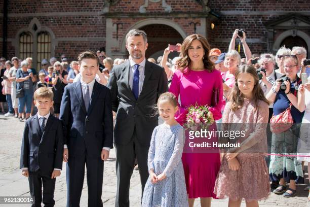 In this handout image provided by MEW and The National History Museum, Crown Prince Frederik of Denmark, Crown Princess Mary of Denmark with children...