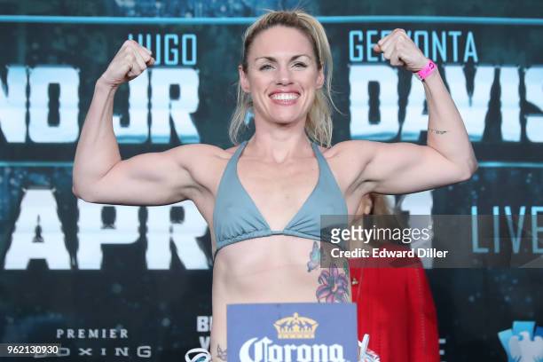 Heather Hardy poses for members of the media at the weigh-ins for the April 21st Showtime Championship Boxing card at the Barclays Center on April...