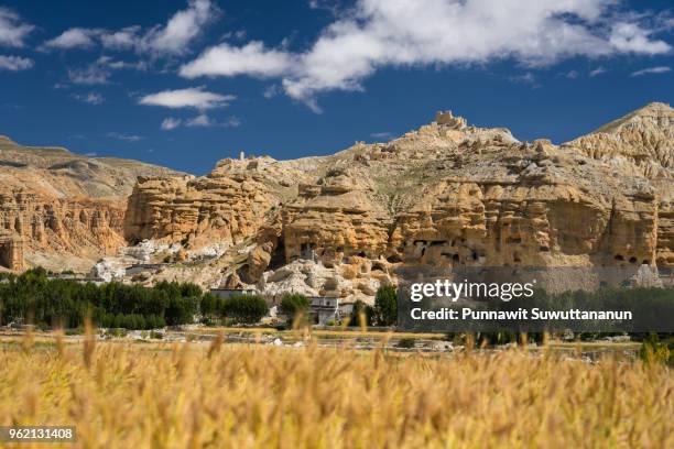 acient cave made by human in upper mustang, lo manthang, nepal - lo manthang stock pictures, royalty-free photos & images