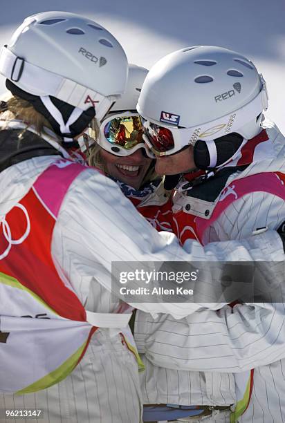 Hannah Teter, Gretchen Bleiler and Kelly Clark of the United States celebrate during the Women's Snowboard Superpipe Final at the 2006 Olympic Games...