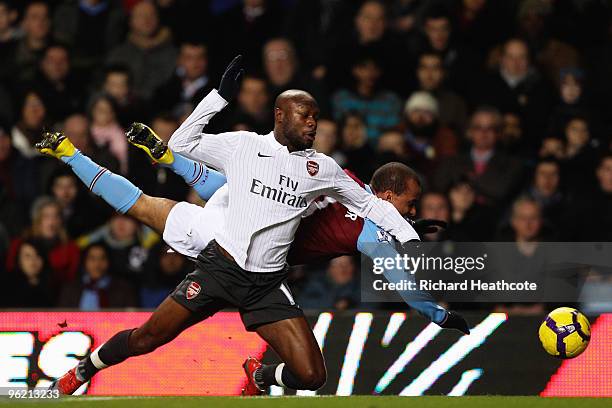 William Gallas of Arsenal and Gabriel Agbonlahor of Aston Villa challenge for the ball during the Barclays Premier League match between Aston Villa...