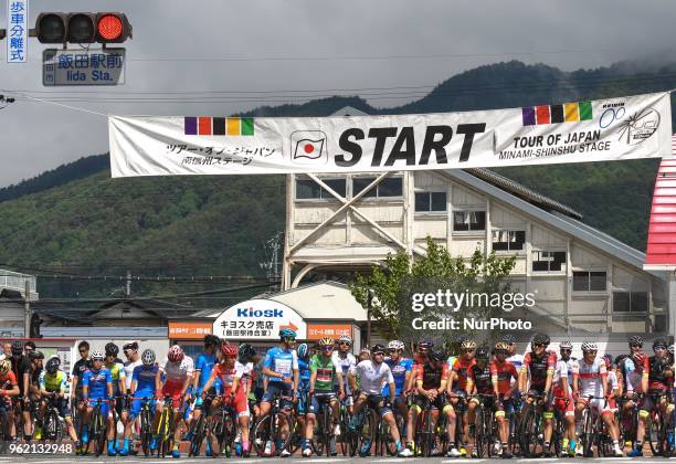 The peloton including Keigo Kusaba , Marco Canola , Grega Bole and Mihkel Raim , awaiting for the start of Minami Shinshu stage, 123.6km on...