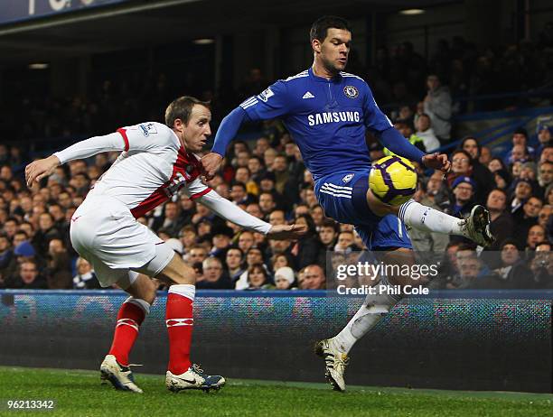 Michael Ballack of Chelsea holds off Lee Bowyer of Birmingham City during the Barclays Premier League match between Chelsea and Birmingham City at...