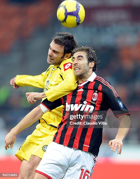 Mathieu Flamini of AC Milan competes for the ball with Paolo Sammarco of Udinese Calcio during the Tim Cup match between Milan and Udinese at Stadio...