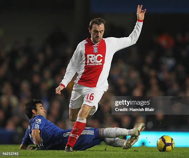 Deco of Chelsea is beaten by James McFadden of Birmingham City during the Barclays Premier League match between Chelsea and Birmingham City at...
