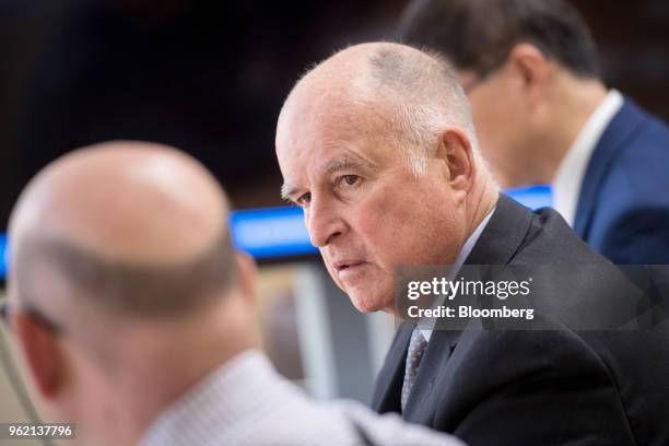 Jerry Brown, governor of California, listens to a question during an interview in Sacramento, California, U.S., on Wednesday, May 23, 2018. The legal...