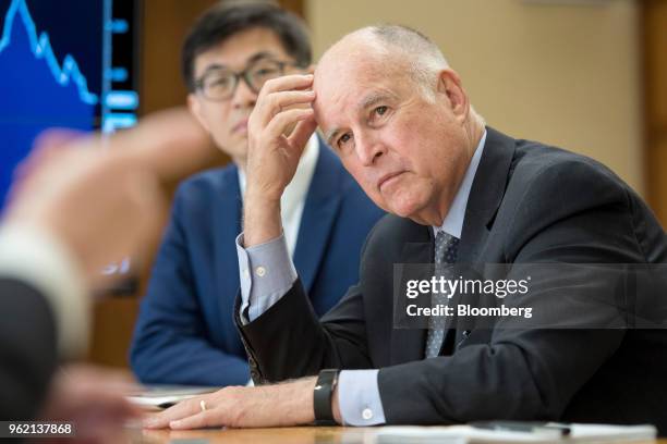 Jerry Brown, governor of California, listens to question during an interview in Sacramento, California, U.S., on Wednesday, May 23, 2018. The legal...