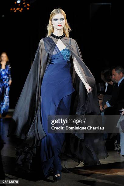 Model walks the runway at the Givenchy Fashion Show during Paris Fashion Week Haute Couture S/S 2010 on January 26, 2010 in Paris, France.