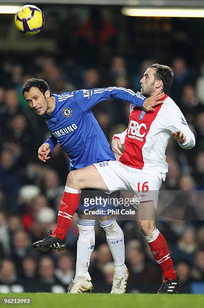 Ricardo Carvalho of Chelsea battles with James McFadden of Birmingham City during the Barclays Premier League match between Chelsea and Birmingham...
