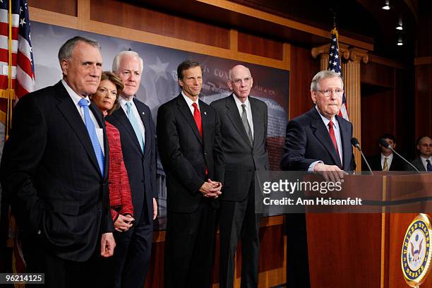 Senate Minority Leader Mitch McConnell takes a question as GOP senators hold a media availability following the Senate Republican Annual meeting...