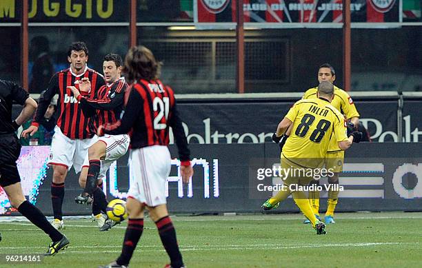 Gokhan Inler of Udinese Calcio score the first goal during the Tim Cup match between Milan and Udinese at Stadio Giuseppe Meazza on January 27, 2010...