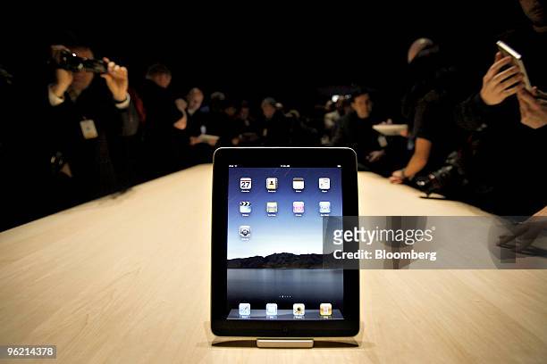 The Apple iPad tablet computer sits on display following its debut at the Yerba Buena Center for the Arts Theater in San Francisco, California, U.S.,...