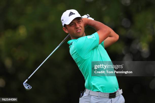 Xander Schauffele plays his shot from the ninth tee during round one of the Fort Worth Invitational at Colonial Country Club on May 24, 2018 in Fort...