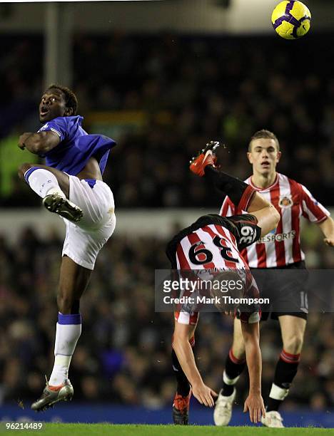 Louis Saha of Everton tangles with Lee Cattermole of Sunderland during the Barclays Premier League match between Everton and Sunderland at Goodison...