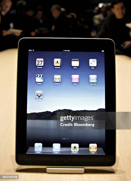 The Apple iPad tablet computer sits on display following its debut at the Yerba Buena Center for the Arts Theater in San Francisco, California, U.S.,...