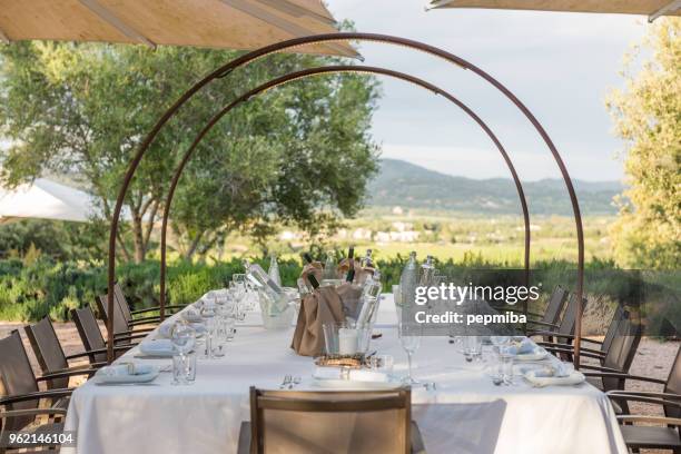 elegant table for dinning at sunset - pepmiba stock pictures, royalty-free photos & images