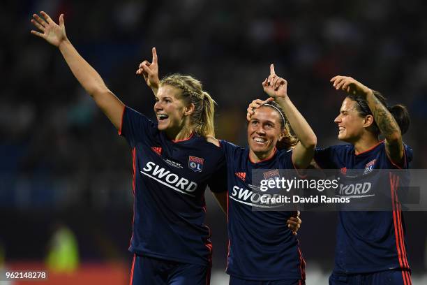 Camille Abily of Lyon celebrates scoring her sides fourth goal with Ada Hegerberg and Dzsenifer Marozsan of Lyon during the UEFA Womens Champions...