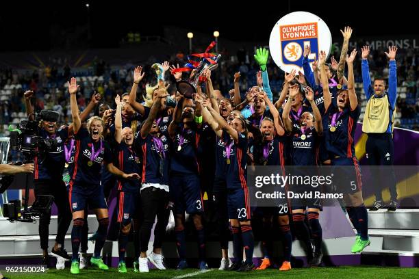 Lyon Women celebrate with the trophy during the UEFA Womens Champions League Final between VfL Wolfsburg and Olympique Lyonnais on May 24, 2018 in...