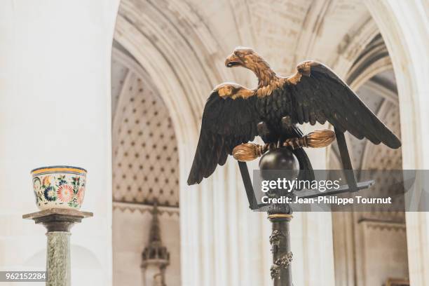 eagle lectern (symbol of john the apostle) in saintes cathedral, france - bookstand stock pictures, royalty-free photos & images