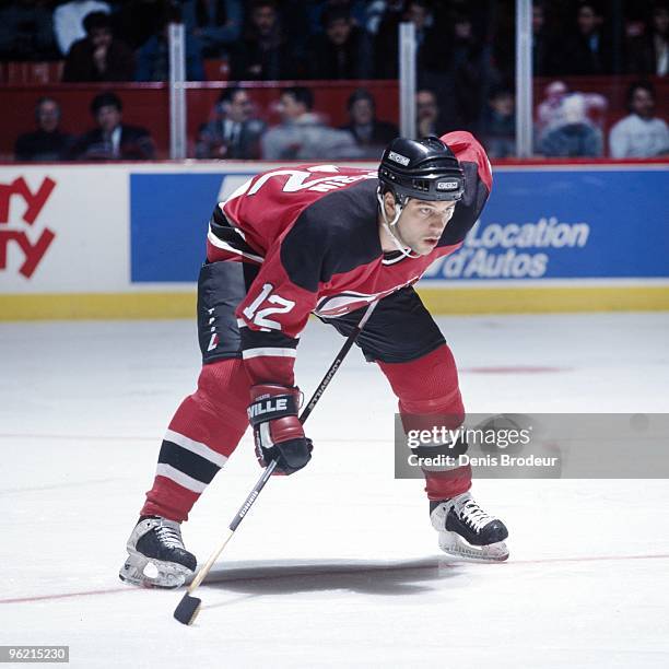 Bill Guerin of the New Jersey Devils skates against the Montreal Canadiens in the 1990's at the Montreal Forum in Montreal, Quebec, Canada.