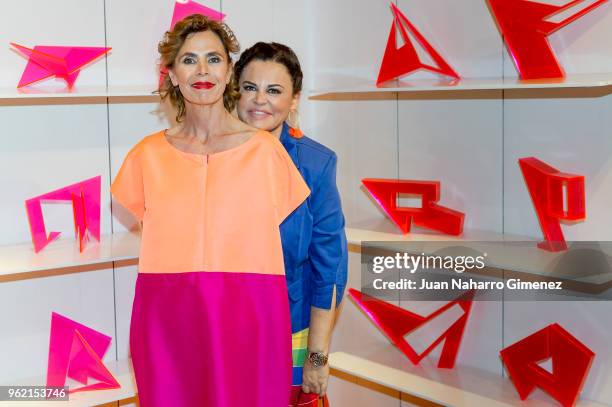 Agatha Ruiz de la Prada and Teresa Bueyes attend Alejandro Dron's Exhibition at Agatha Ruiz de la Prada store on May 24, 2018 in Madrid, Spain.