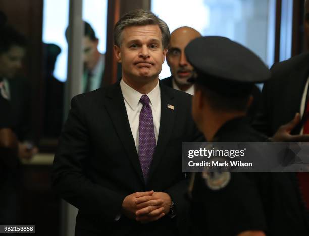 Director Christopher Wray arrives to brief members of the so-called 'Gang of Eight' at the U.S. Capitol May 24, 2018 in Washington, DC. The...