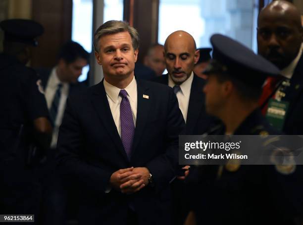 Director Christopher Wray arrives to brief members of the so-called 'Gang of Eight' at the U.S. Capitol May 24, 2018 in Washington, DC. The...