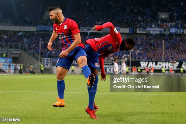 Oguzhan Takyi and Johannes Doerfler of Uerdingen celebrate the fir4st goal during the Third League Playoff first leg match between KFC Uerdingen and...