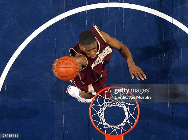 Adonis Thomas of the Melrose Golden Wildcats goes up for a dunk against the Germantown Red Devils on January 17, 2010 at FedExForum in Memphis,...