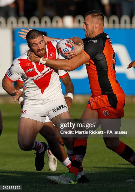 St Helens' Kyle Amor is tackled by Castleford Tigers Liam Watts during the Betfred Super League match at the Mend-A-Hose Jungle, Castleford.