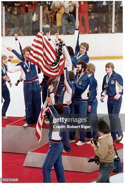 Members of the USA hockey team celebrate after winning the Gold Medal during the 1980 Winter Olympics on February 24, 1980 in Lake Placid, New York.