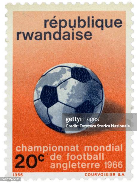 Stamp issued by the Rwandan Post to commemorate the football world championship held in England from 11 to 30 July, 1966. Nominal value 20 c,...