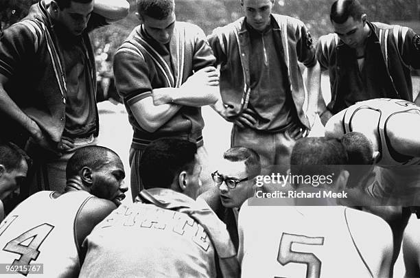 Final Four: Ohio State coach Fred Taylor talking with players in huddle during timeout of game vs Wake Forest. View of OSU John Havlicek and Bobby...