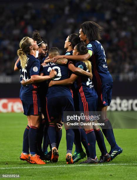Camille Abily of Lyon celebrates scoring her sides fourth goal with team mates during the UEFA Womens Champions League Final between VfL Wolfsburg...