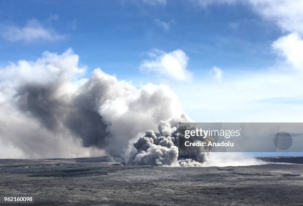 An ash plume rises from Kilauea volcano in Hawaii, United States on May 23, 2018. Lava from the volcano reached the coast of the Pacific Ocean...