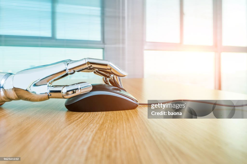 Computer Robot Hand Robots Hand Using Computer Mouse High-Res Stock Photo - Getty Images