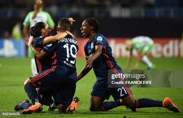 Olympique Lyonnais' Dutch forward Shanice Van De Sandern , Olympique Lyonnais' Canadian defender Kadeisha Buchanan and a teammate celebrate their...